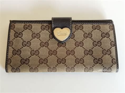 portafoglio gucci roma eur|Portafogli Gucci da donna .